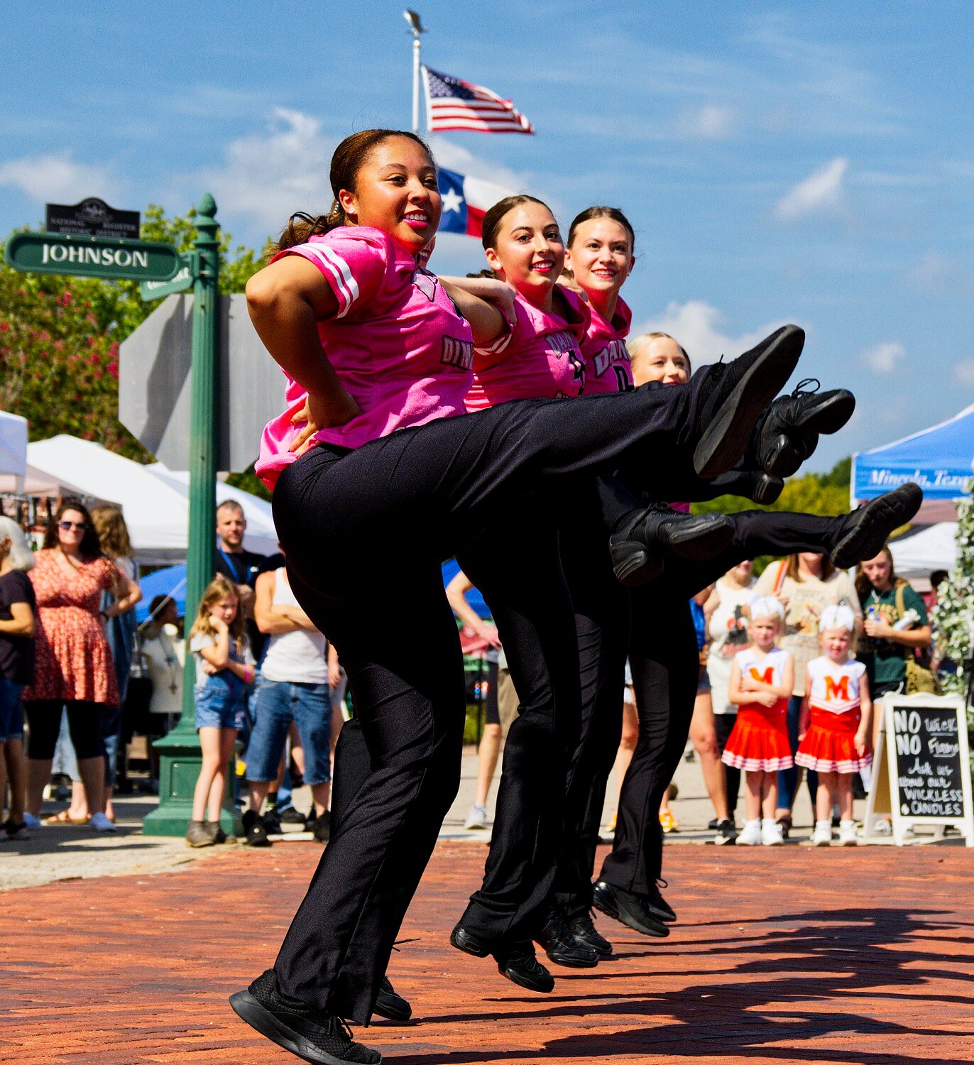 Dance Dimensions' team of Rhythm Elite shows off their high-kicks in line. [additional iron horse images available]